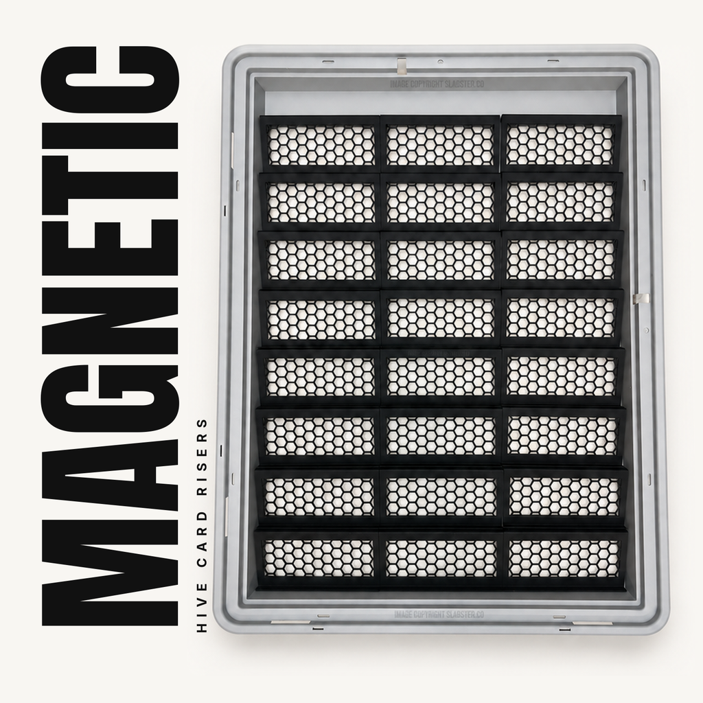 24 black magnetic honeycomb risers in three columns inside a gray Zion display case, with MAGNETIC running up the left side