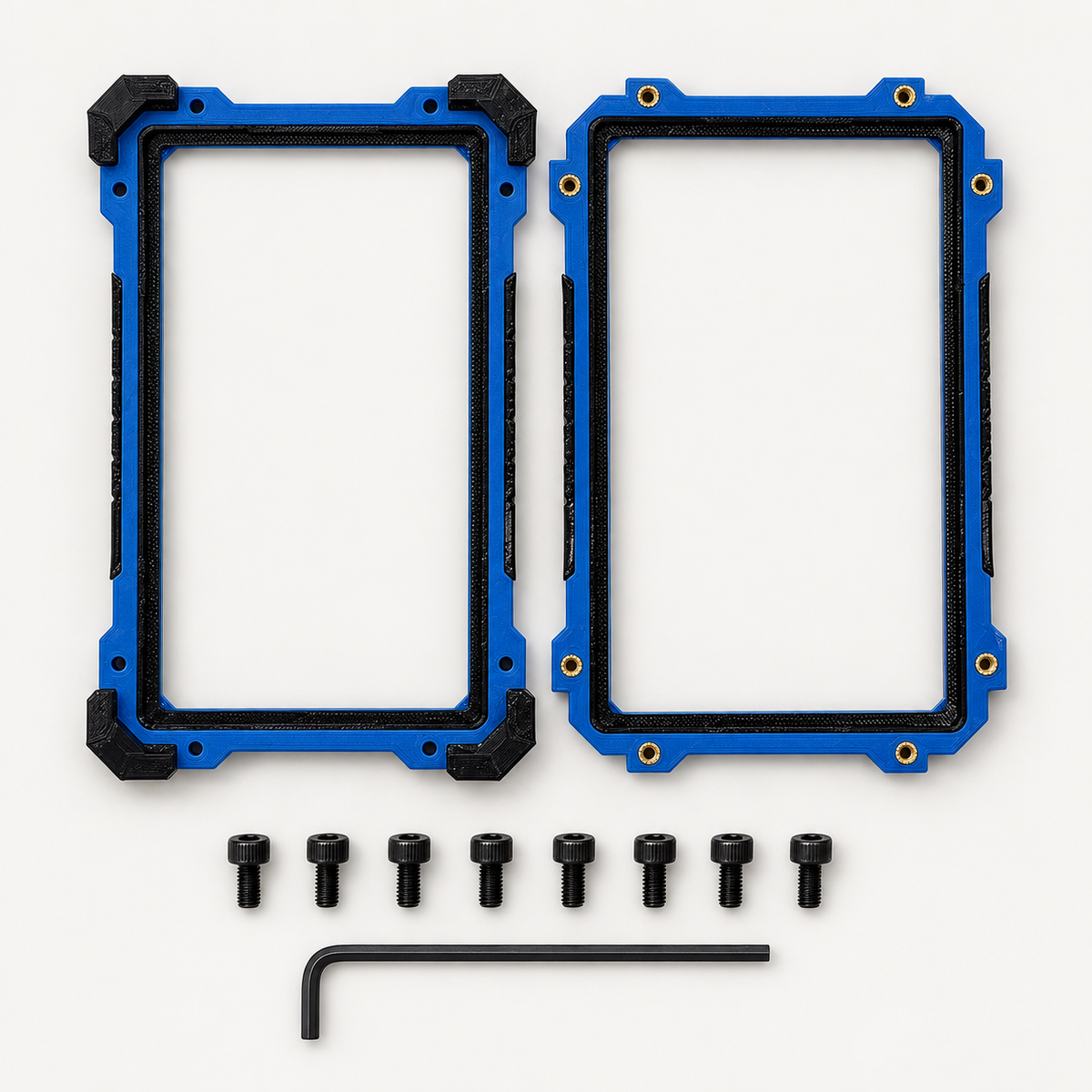 Slabster EXO taken apart: the two frame halves, eight black M3 screws and the included 2.5 mm hex key