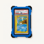 Slabster EXO in Marine Blue with black TPU corners and side strips, holding a PSA 10 graded Pokémon card, front view