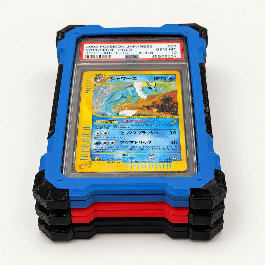 Three Slabster EXOs stacked: Marine Blue on top, then Scarlet Red and Charcoal