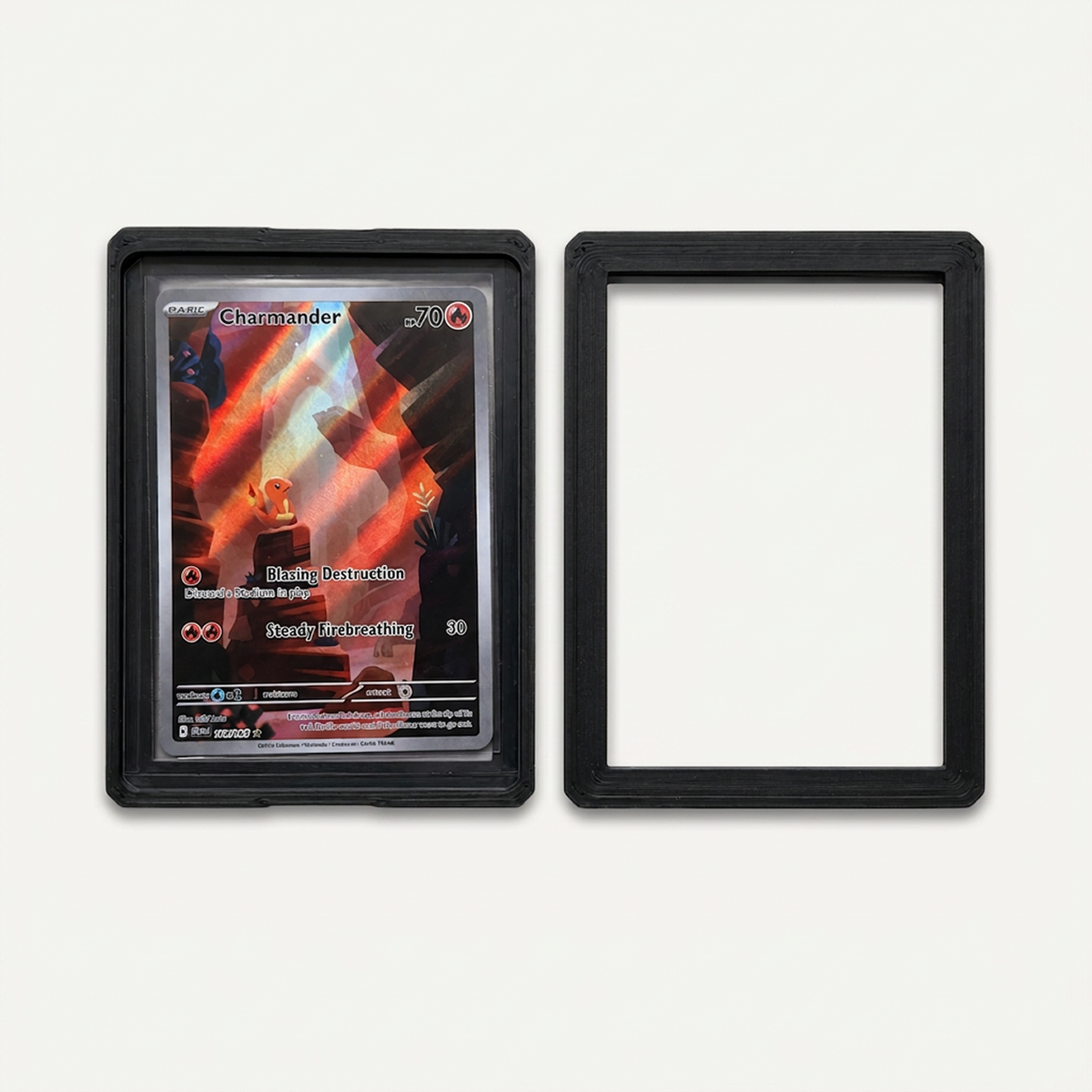 Black toploader guard opened into its two halves, one half holding a card in a toploader