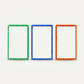Green, blue, and orange holographic PSA slab bumpers side by side
